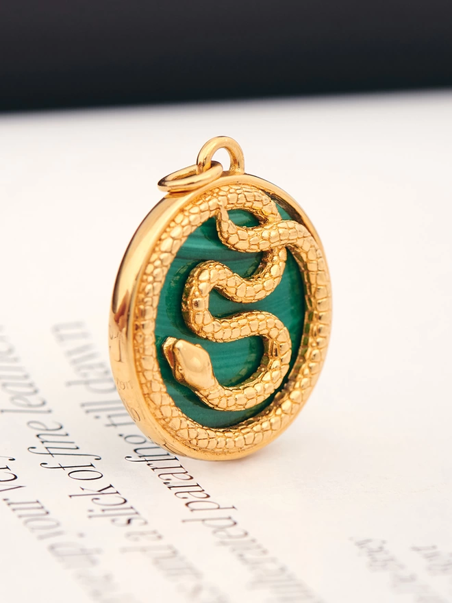 Aesclepius Snake gold Medallion on malachite stone