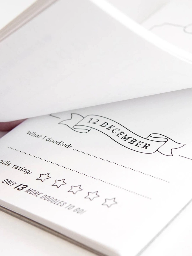 Odd Goose Creative Advent Calendar Doodle A Day notepad close up of page with star rating and date