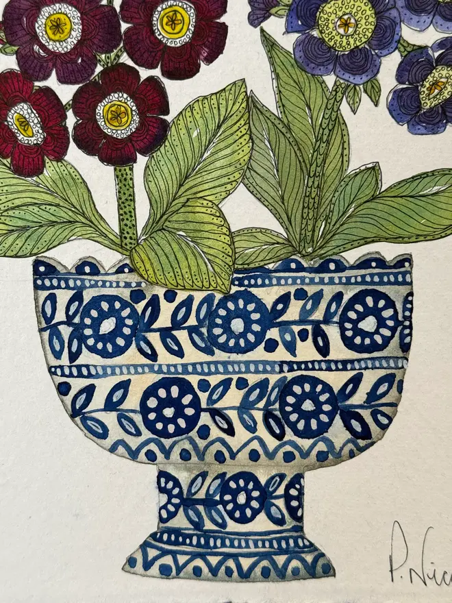Auricular flowers in blue & white ceramic vessel
