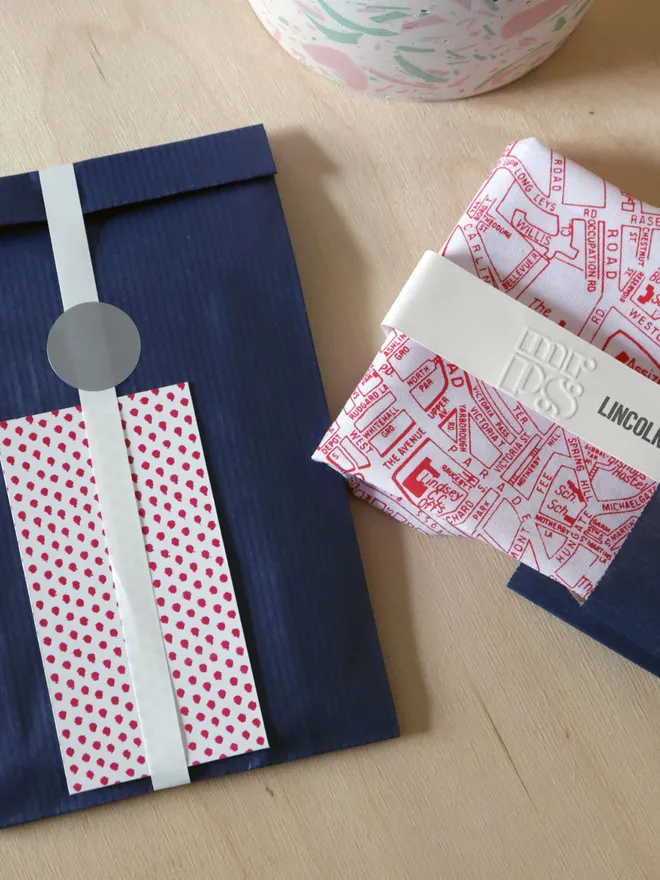 Example of optional gift wrap of a red Mr.PS Lincoln map handkerchief