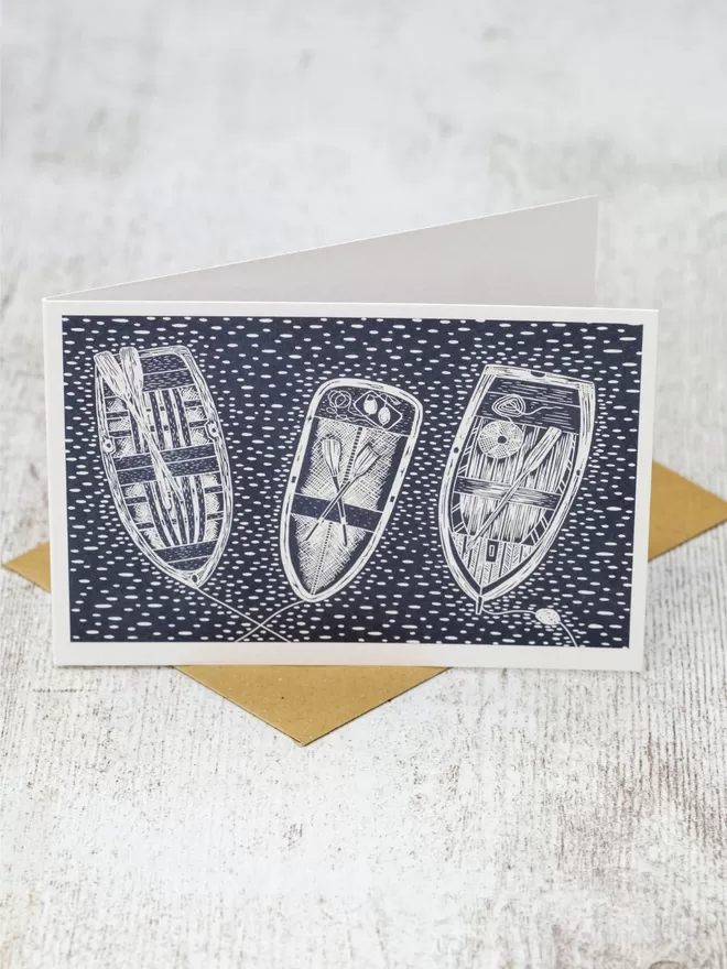 Greeting Card with an image of Three Rowing Boats, taken from an original lino print