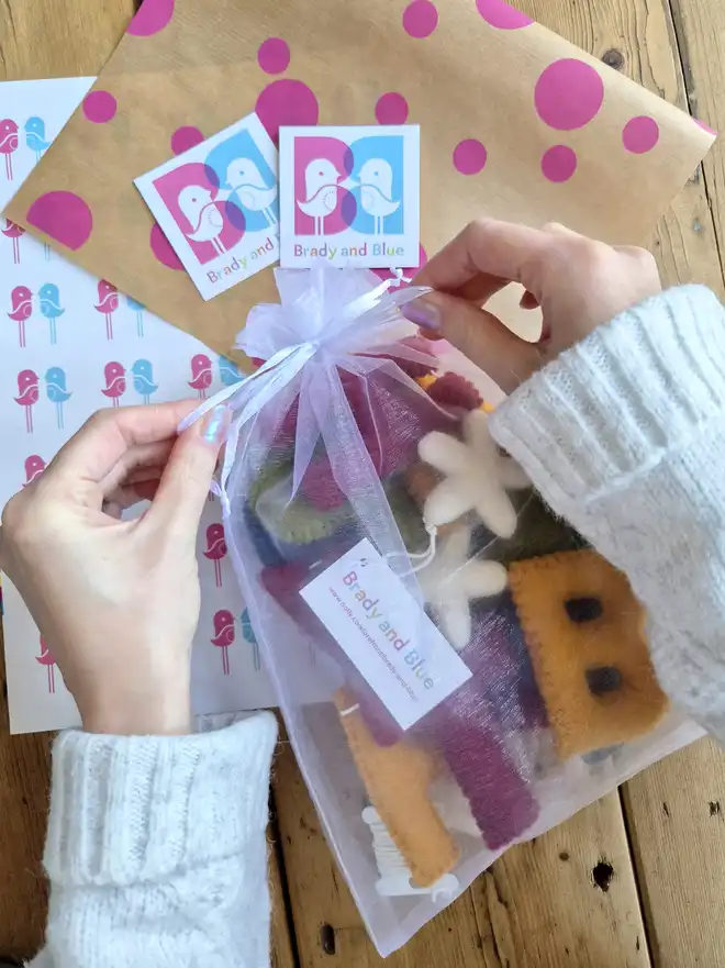Felt Wool Happy Birthday banner packaged in an organza bag.