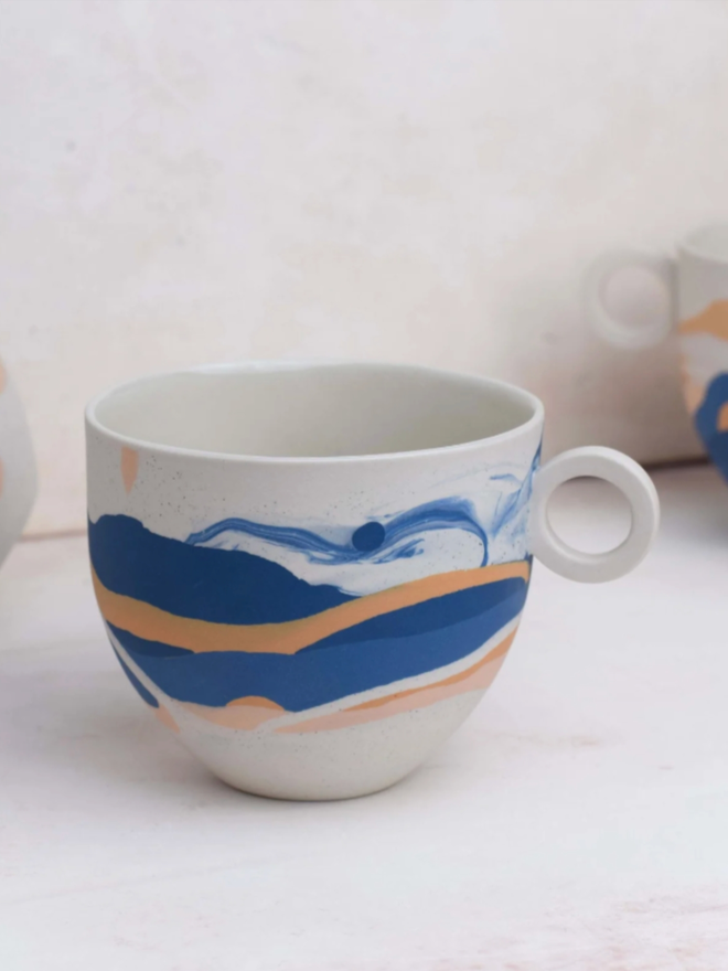 Shore Dreamlands Mug. A mug from the Shore Dreamlands collection, showing typical decoration style.