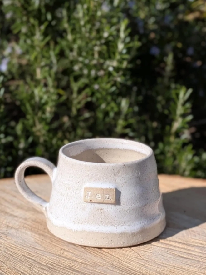 Personalised Stoneware Coffee Cup. A rustic handmade mug in shoreline.