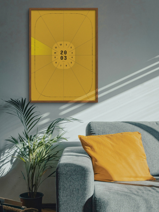Sundial Personalised Date Poster. A sundial poster on a wall in gold.