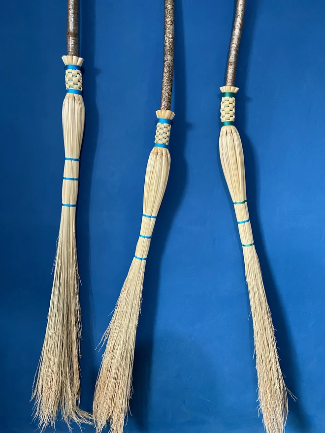 Three handmade cobweb brooms