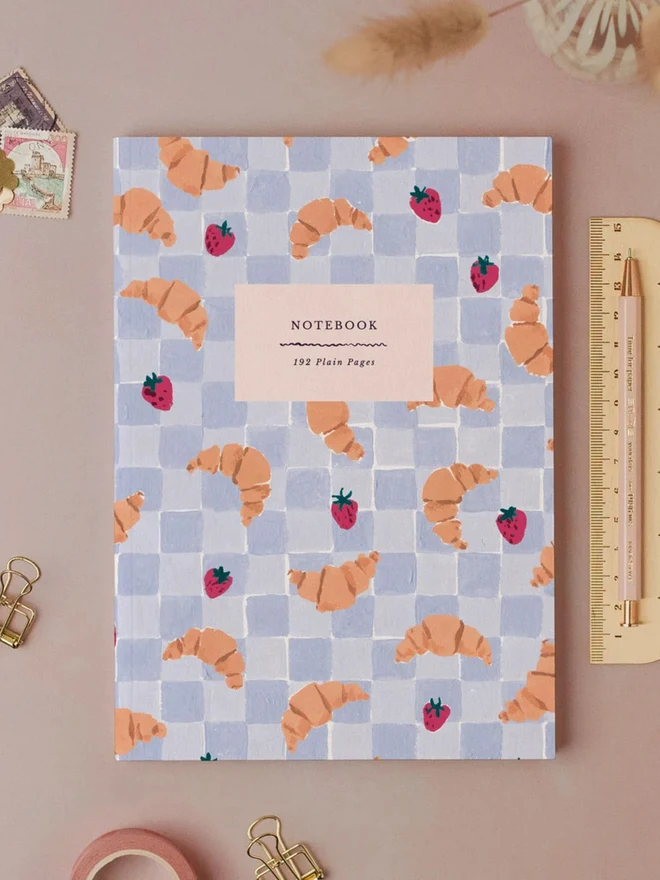 Croissant Cafe Notebook by Sister Paper Co with a hand-painted croissant and strawberry cover