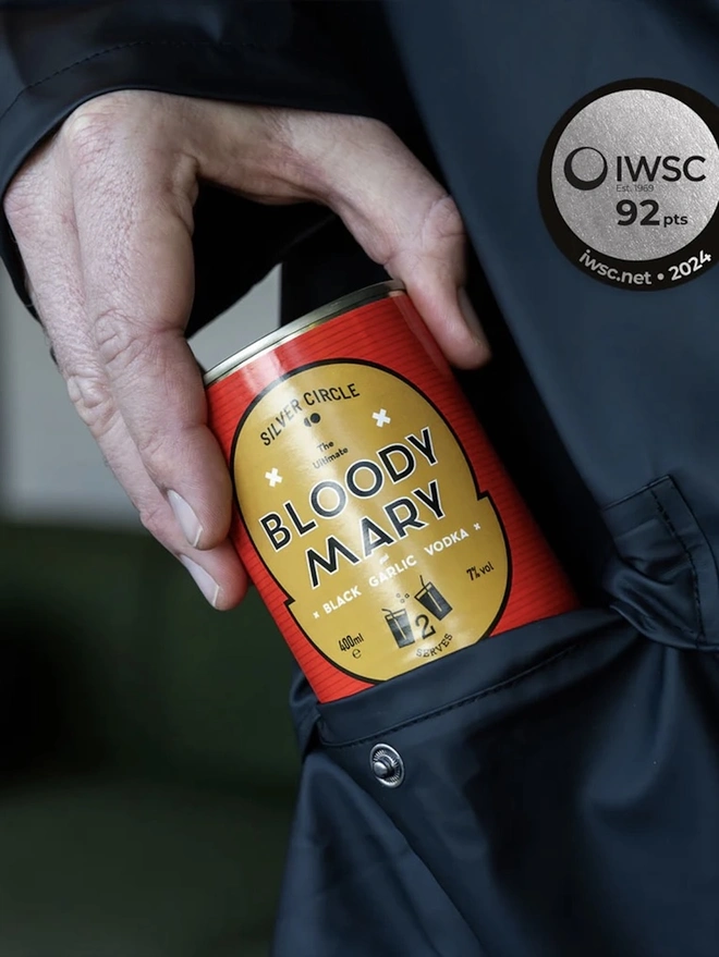 The Ultimate Bloody Mary In A Soup Can (Set Of 1, 2, 4), man taking can out of pocket. 