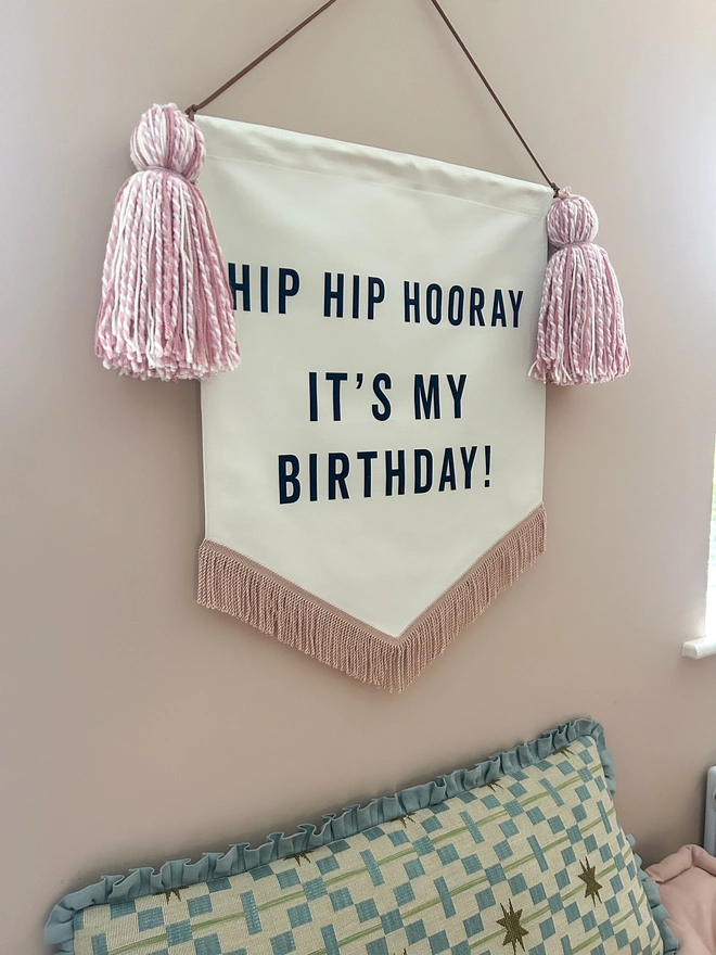 Hip Hip Hooray Fabric Birthday Banner with pink tassels and a rose gold trim