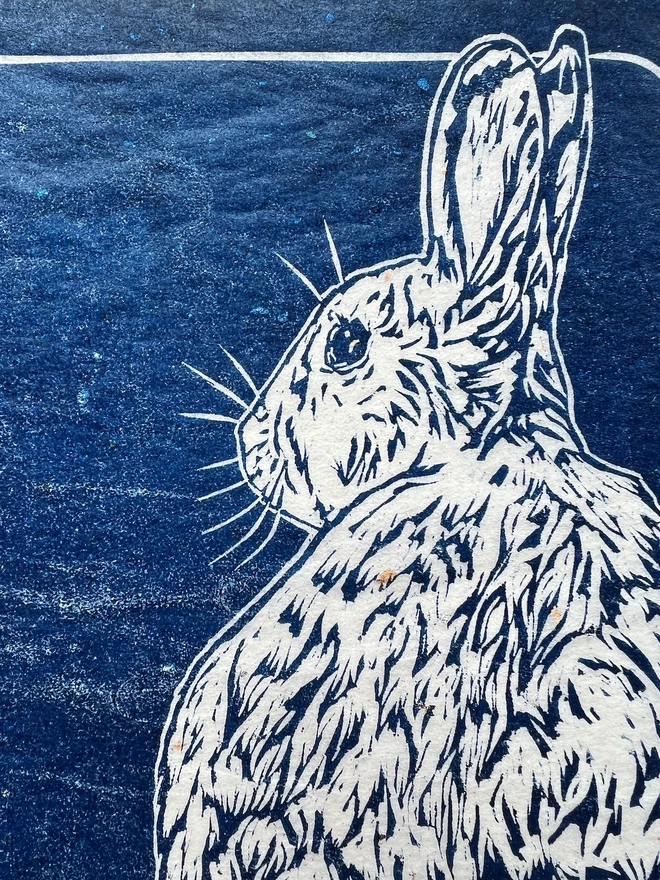 detail of fluffy bunny linocut print