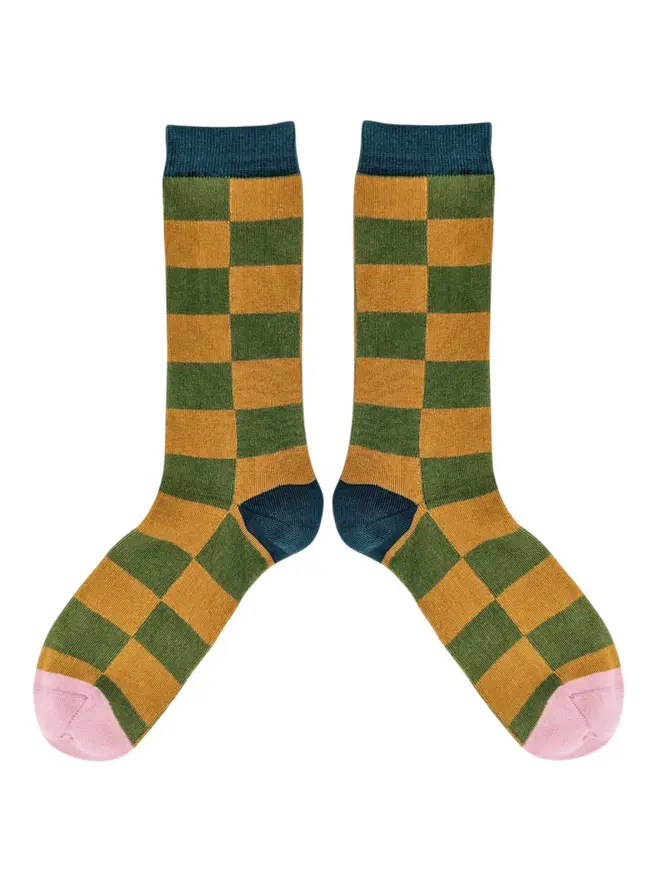 Men's Battenburg Check Organic Cotten Ankle Socks, a pair of colourful patterned socks sitting on a plain white surface. 