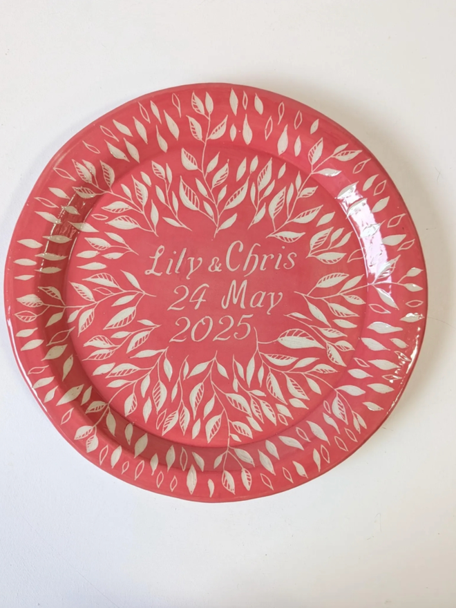 Stoneware Anniversary Plate. An anniversary plate in red.
