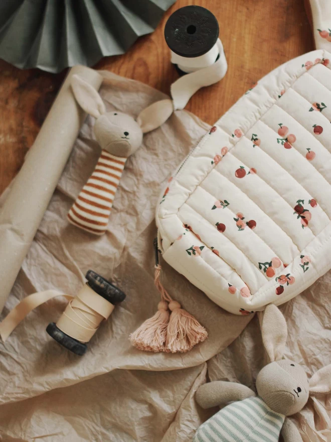 Sets of peachy wash bag and cute rattles