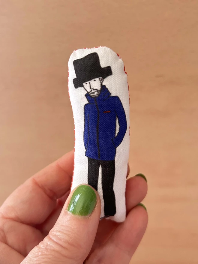 Mini fabric doll featuring illustration of Jamiroquai frontman, Jay Kay.
