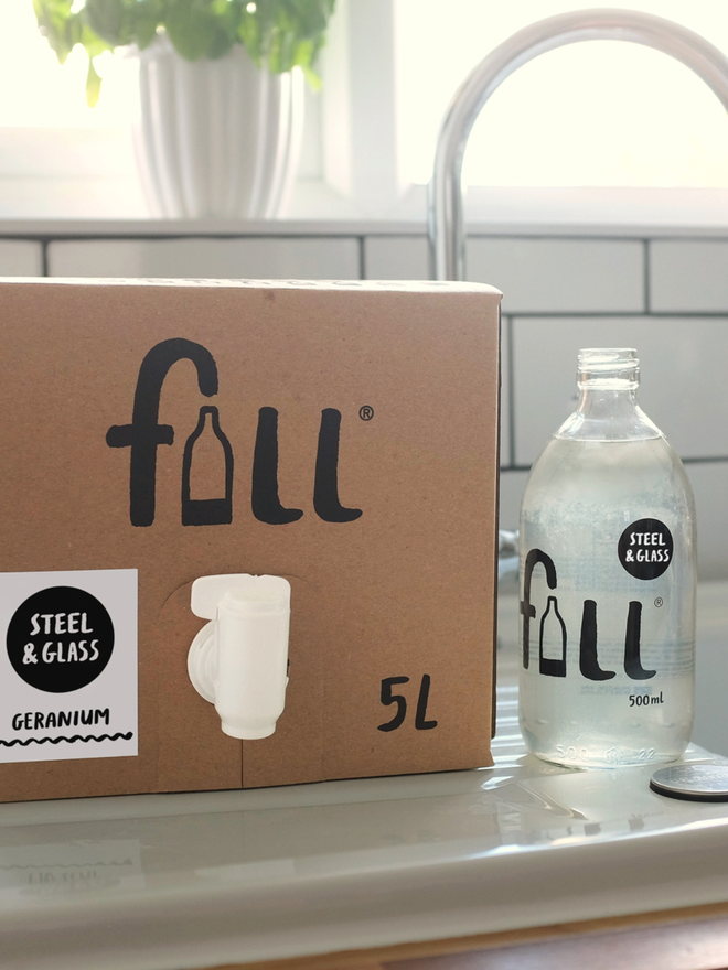 Steel and Glass Cleaner. A box of steel and glass cleaner refill and a 500ml bottle.