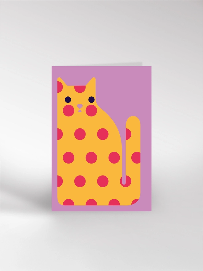 Greeting card featuring an illustrated spotty cat