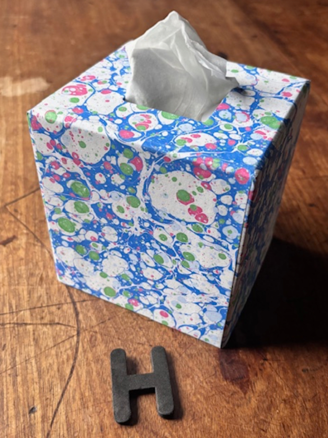 Tissue Box. A tissue box in H.