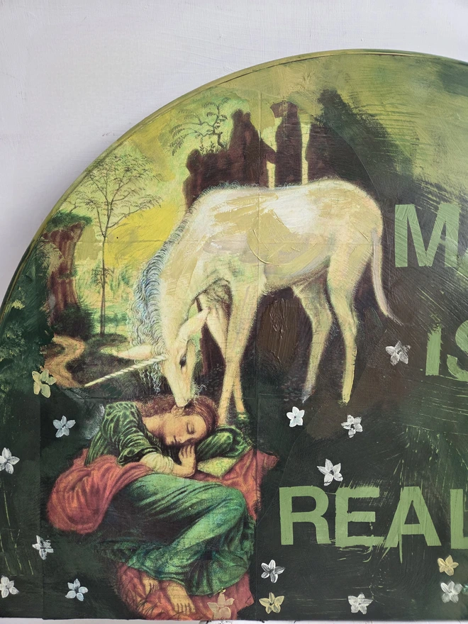 A magical unicorn art panel made from a reclaimed table-top
