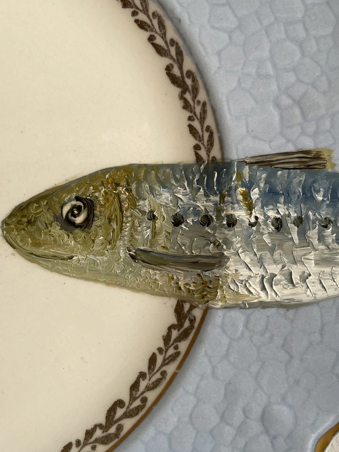 Detail Sardine Painting On Vintage Plate