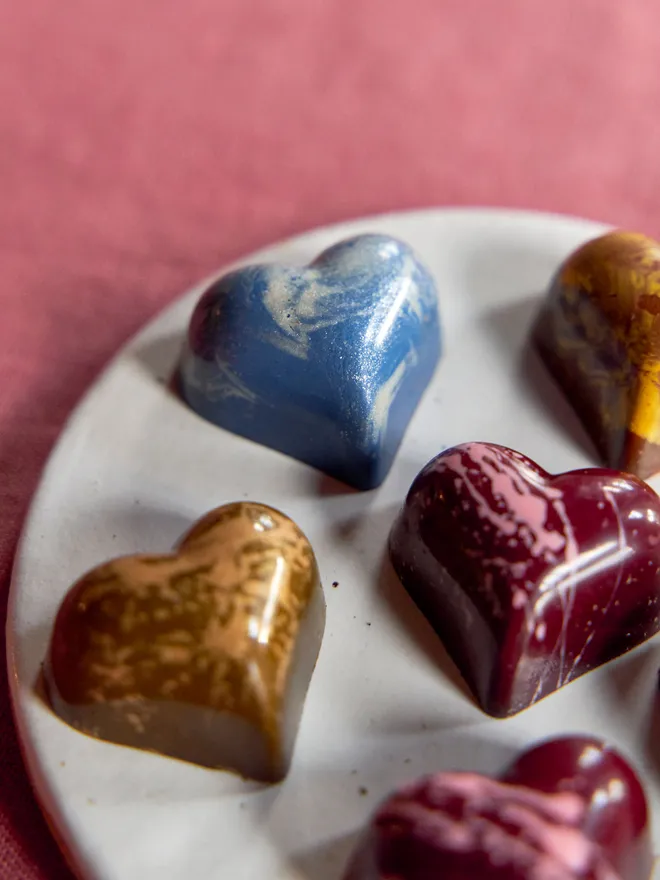 Set of four heart chocolates for Valentine's Day. 