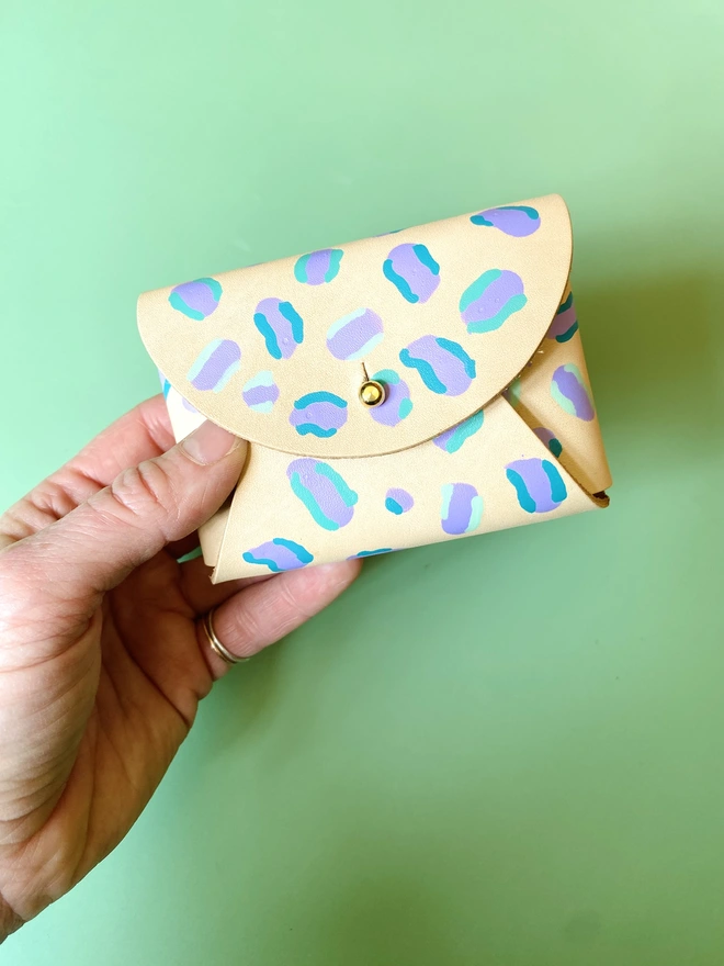 colourful hand painted purse with fastening