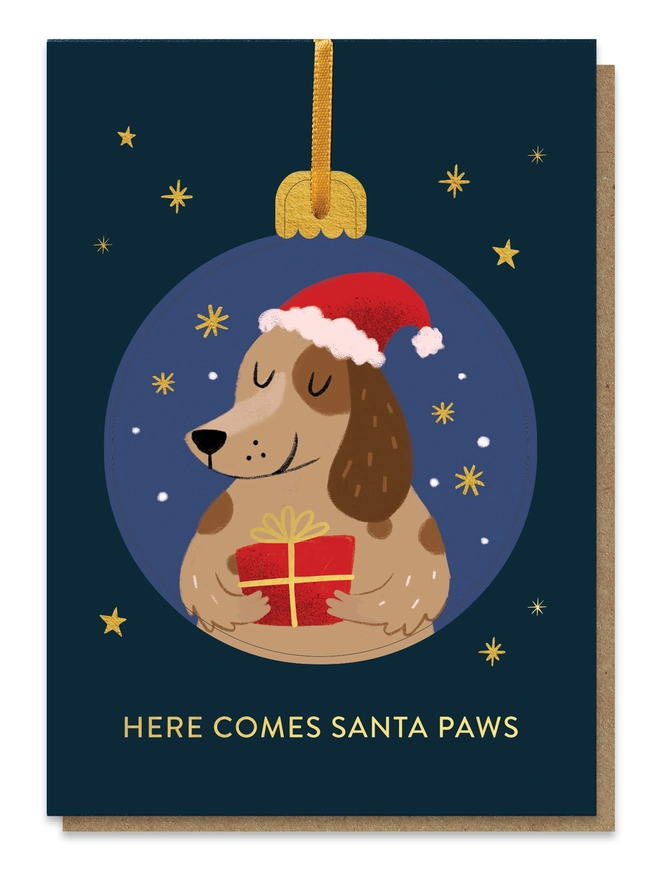 Close up of Christmas pop-out bauble card with a dog illustration on it.