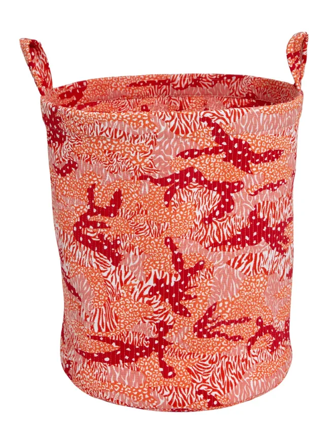 Orange Big Cat Camo Quilted Storage Basket, an orange camouflage animal print basket sitting against a white backdrop.