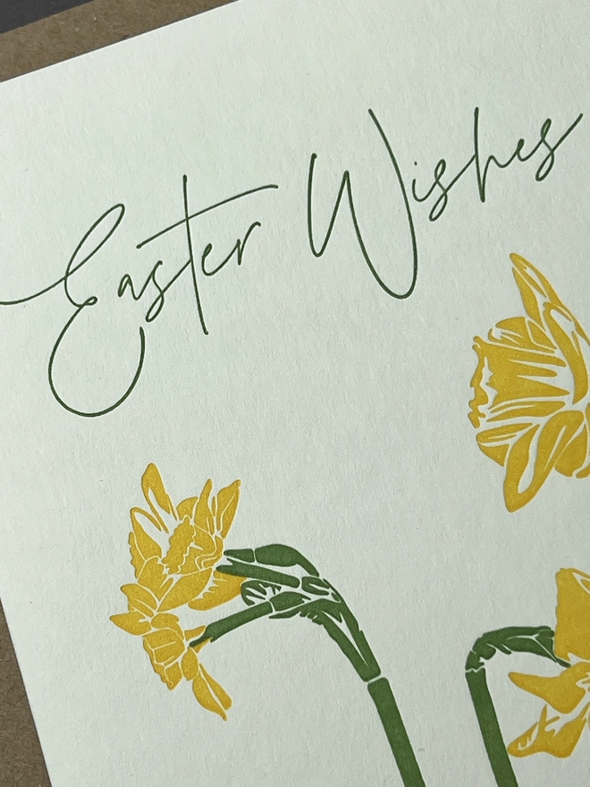 Close up of the card showing A couple of Daffodils and "Easter Wishes"
