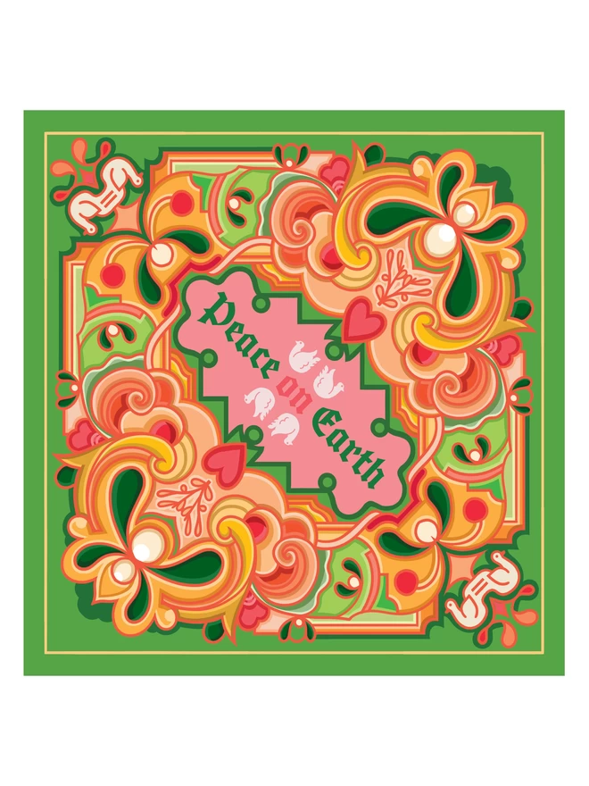 An abstract Christmas card design with Peace on Earth at the centre with drawings of two doves above and two below, surrounded by a multi-coloured design on a green background. The card features greens, pinks and oranges. 