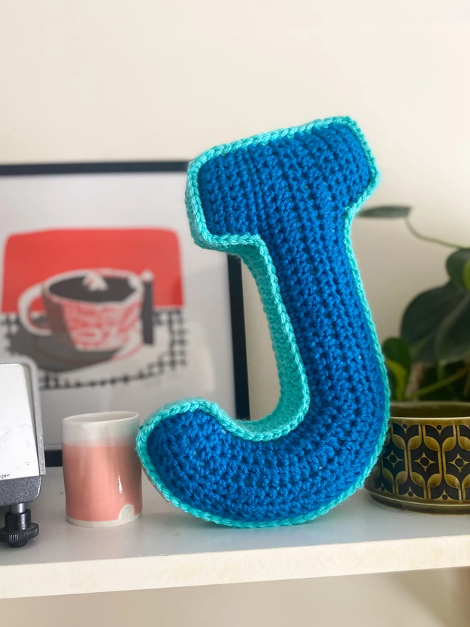 Crochet J Cushion in Blue and Teal