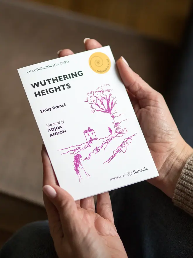 Wuthering Heights By Emily Brontë Audiobook In A Card, being held. 