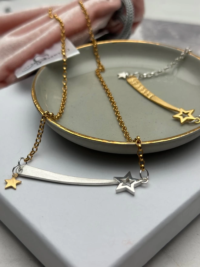 sterling silver chain with gold shooting star charm and silver mini star