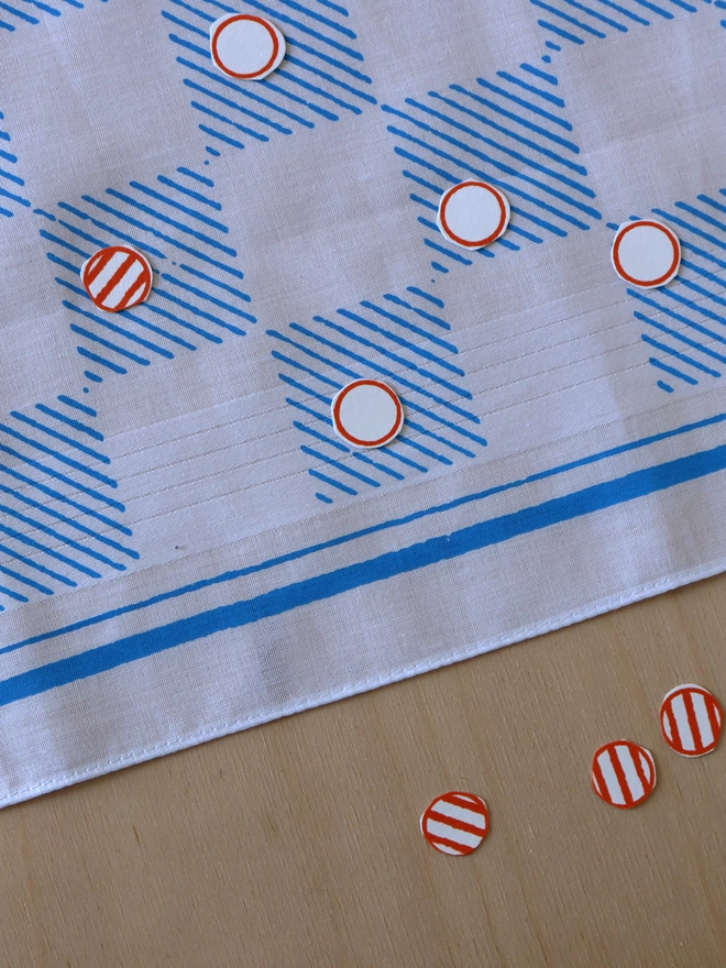 detail of Mr.PS Checkerboard hankie with cut-out paper counters