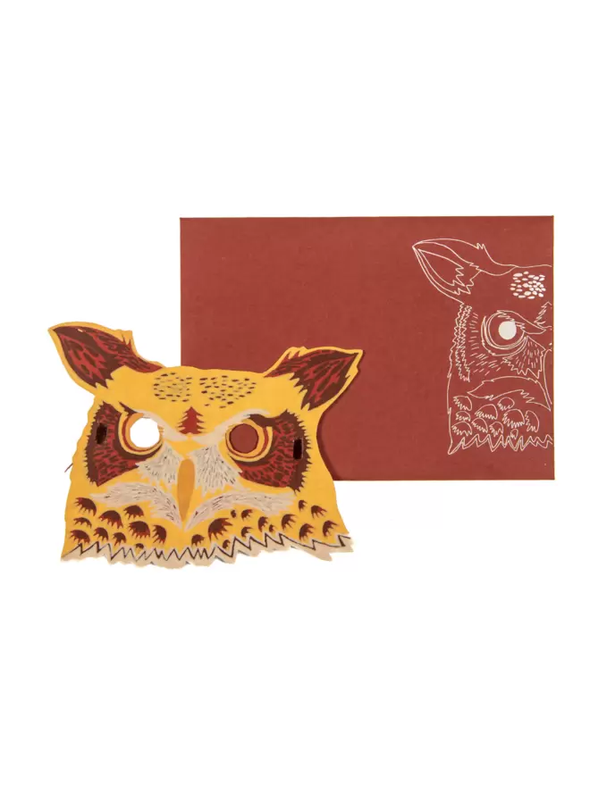 Full shot of image of brown owl head and matching brown envelope with an owl motif