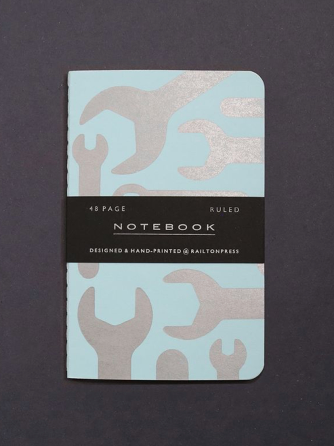 Lined Spanner Pocket Notebook. A notebook in pastel blue