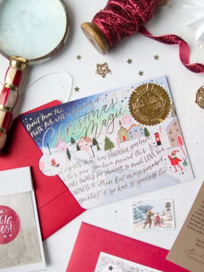 A night-sky certificate with elves, a red postbox and a gold "Nice List Approved" seal.