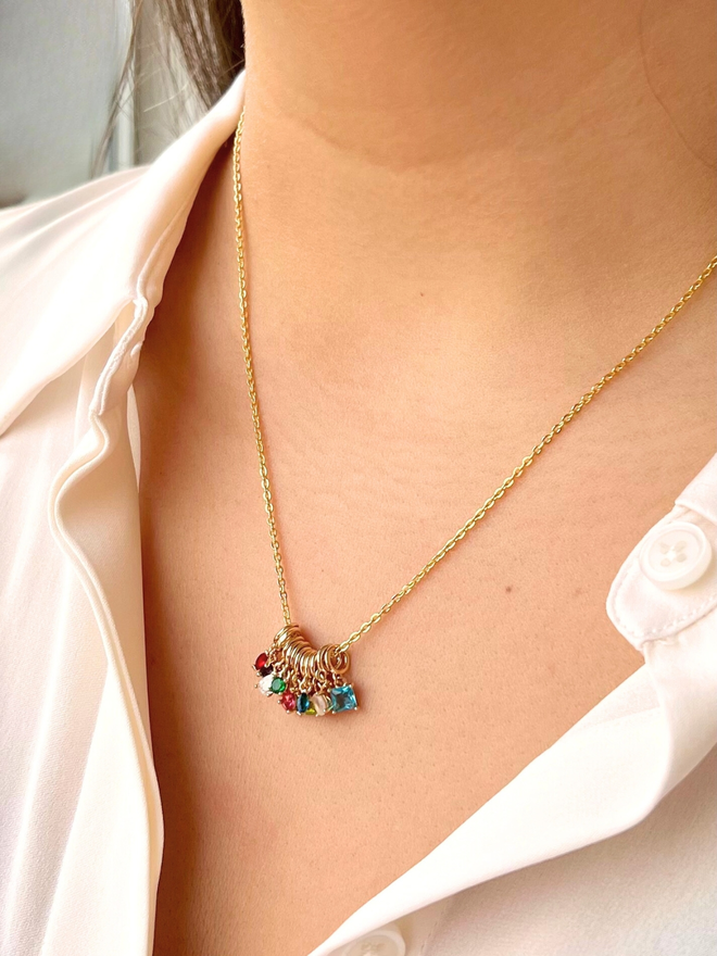 all mini birthstones charm necklace on fine gold chain