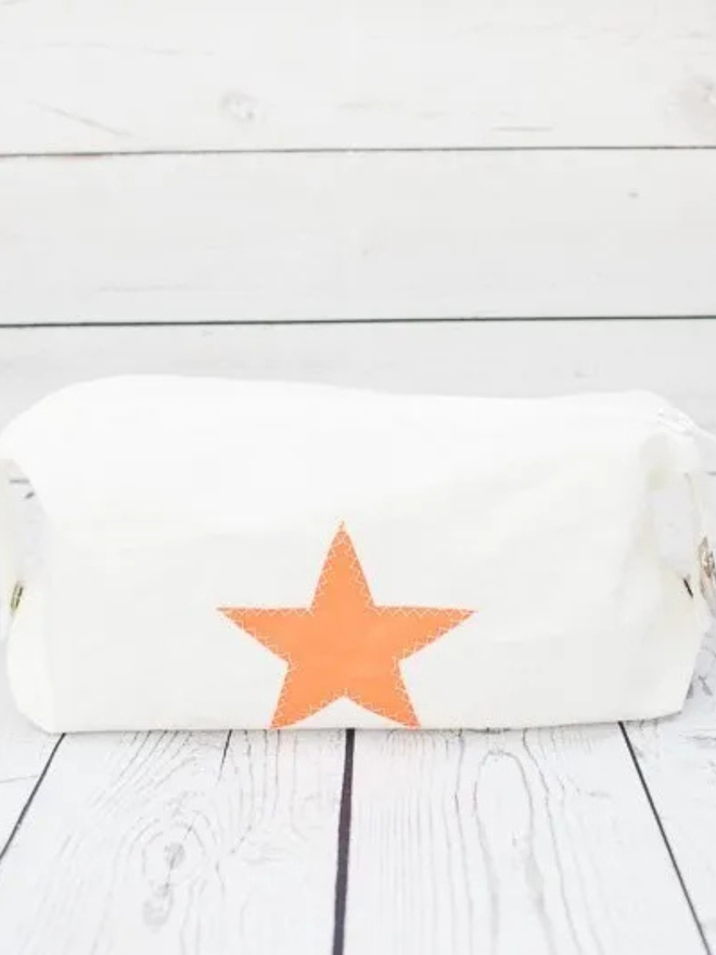 star canvas wash bag orange