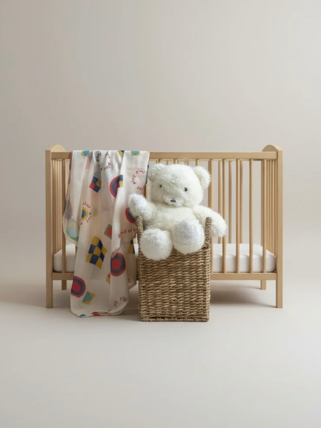 Bauhaus Play Muslin. A muslin laid over a crib.