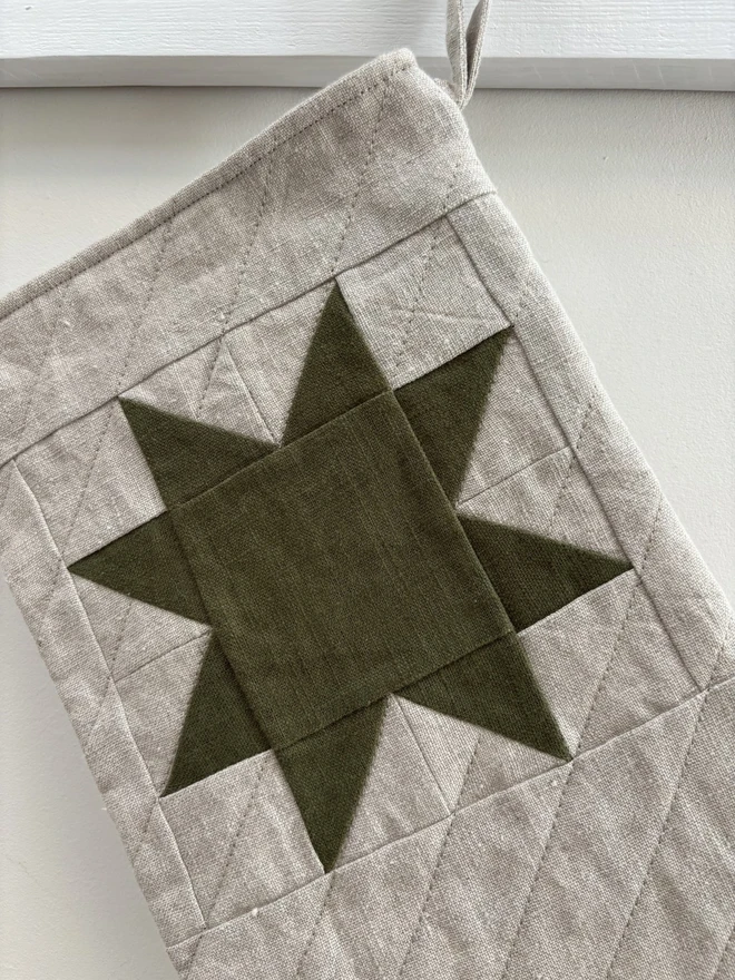 Green Linen Star Detail on Natural Linen Quilted Christmas Stocking.