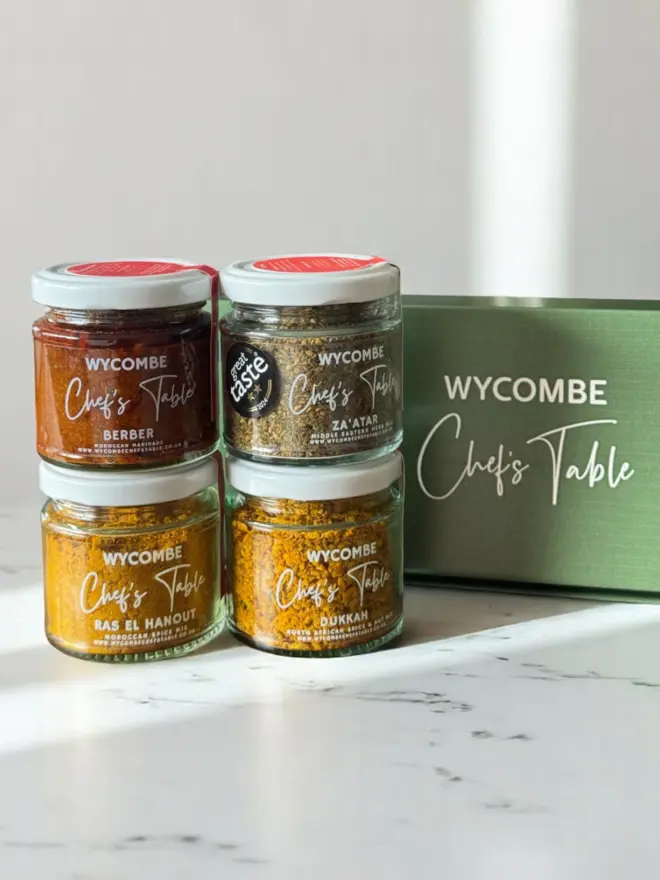 Vibrant Middle Eastern spice blends from Wycombe Chefs Table Spice Blend Makers, featuring warm, aromatic mixes like Za’atar, BERBER MARINADE, and DUKKAH in beautifully labelled glass jars. Perfect for adding authentic Middle Eastern flavour to your dishes.