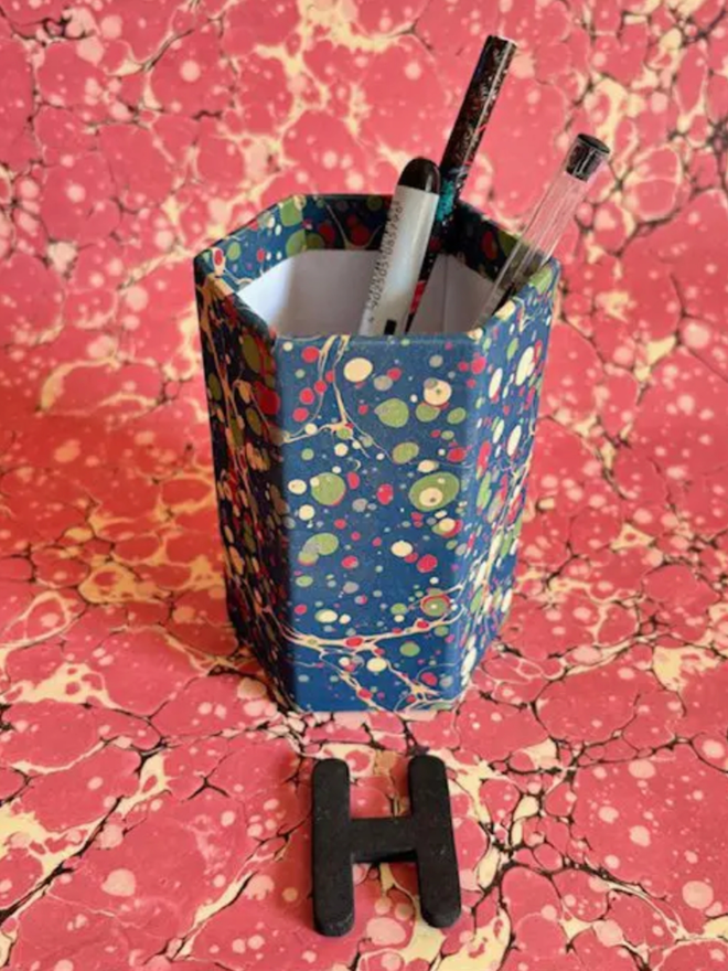 Pen Pot. A pen pot in H