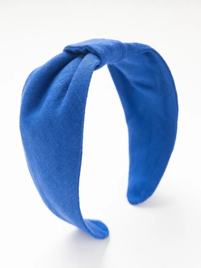 Vanessa Rose Ines Hairband in French Blue seen from the side.