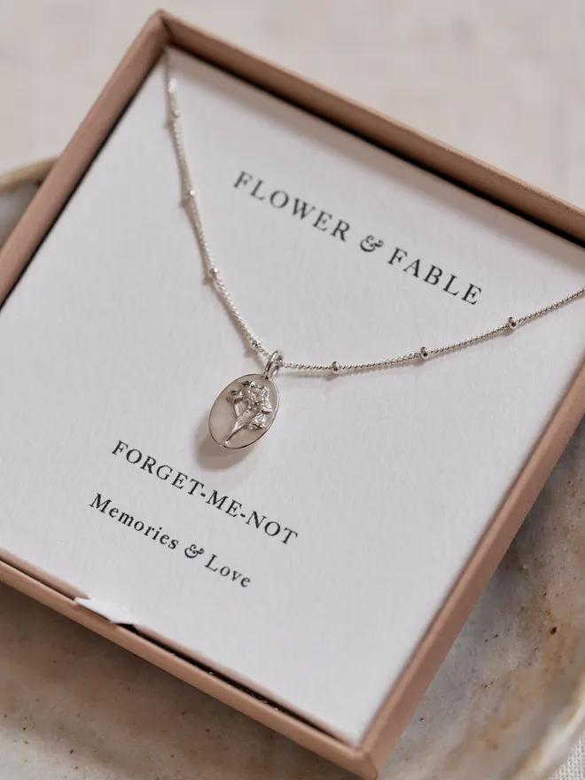 Flower and fable grief charm necklace