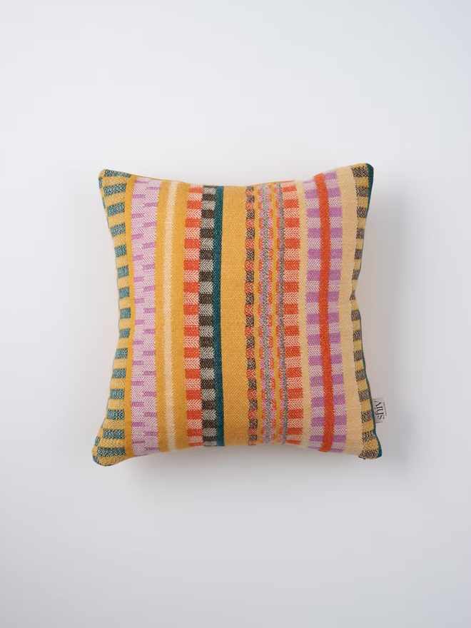 aoife square cushion. a multi coloured patterned square cushion photographed on a white background.