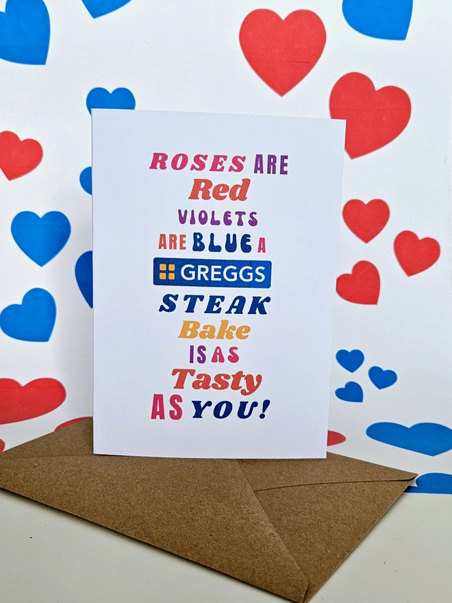  A humorous valentine greeting card that says rose are red violets are blue a Greggs Steak Bake is a tasty as you in colourful text in different fonts