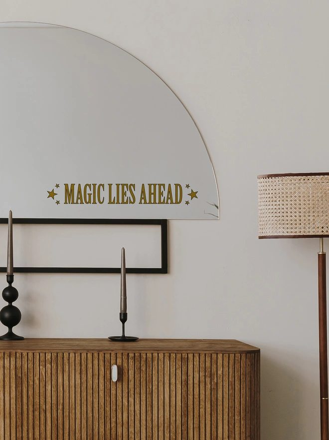 Magic Lies Ahead wall and mirror sticker by Joanie and Jeanie – black lettering decal ideal for teenage bedroom décor and Halloween.