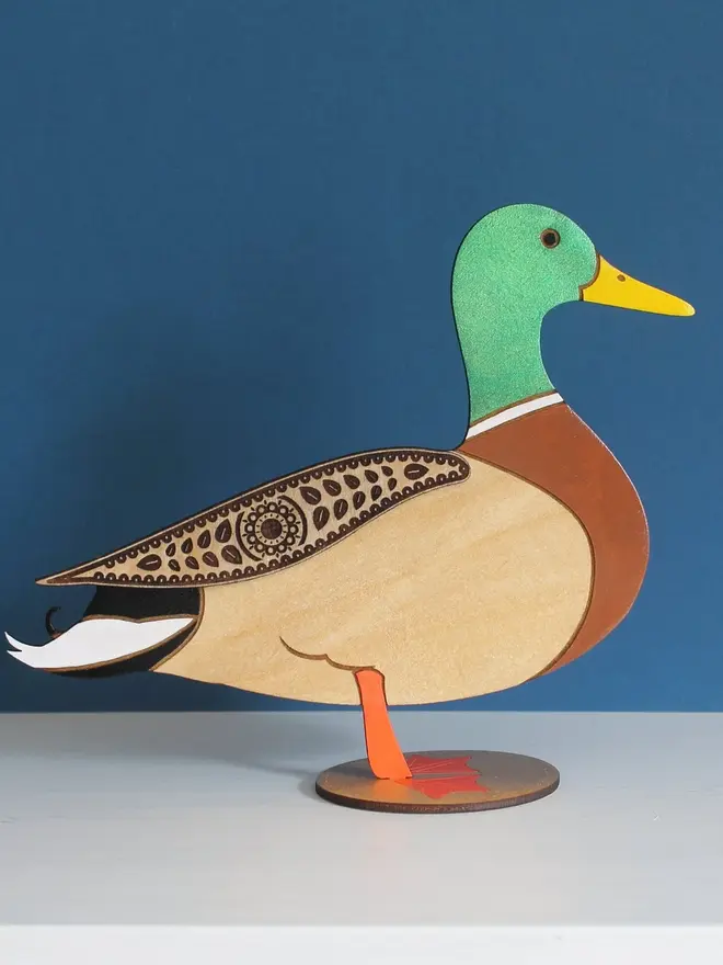 Standing Wooden Mallard Duck, wooden bird decoration standing on a platform. 