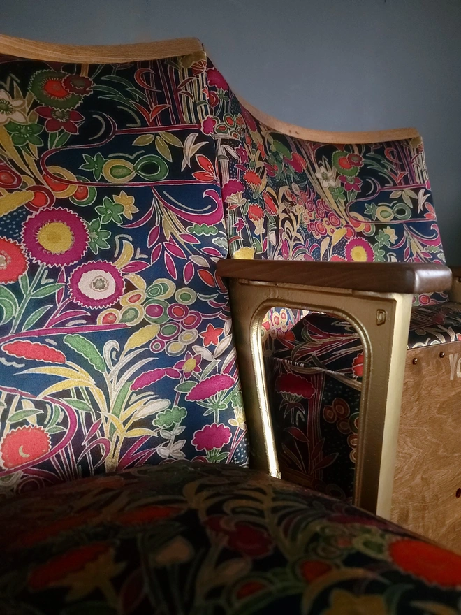 Floral velvet cinema seats with gold metal frame