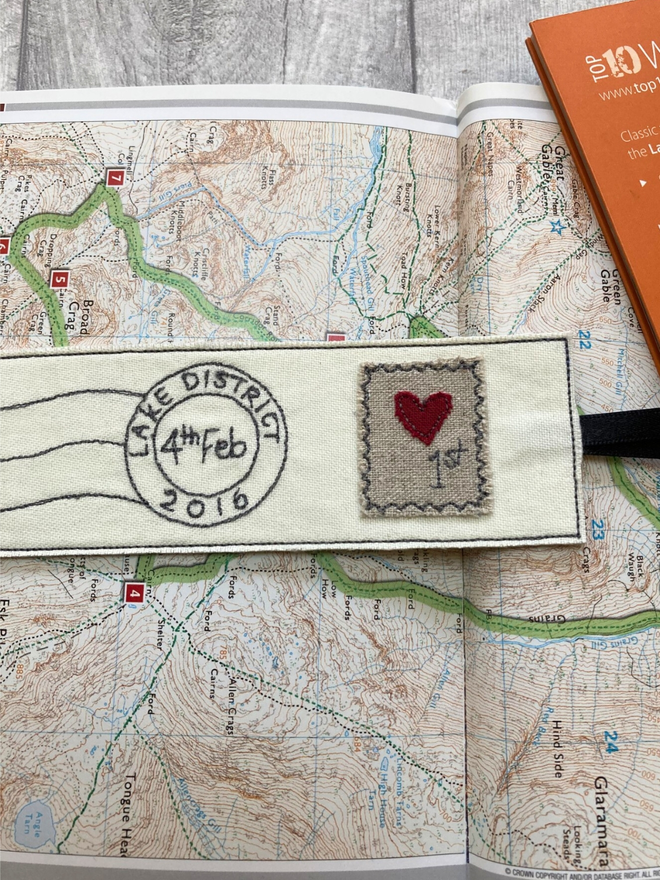Embroidered postmark bookmark close-up of personalisation